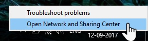 Click vào Open Network and Sharing Center